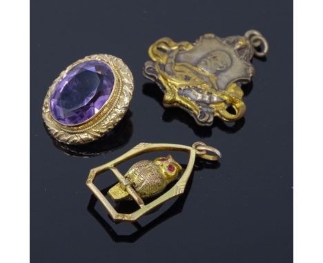 An unmarked yellow metal stone set owl pendant, an unmarked gold amethyst pendant, and a gilt-metal Coronation pendant, heigh