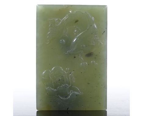 A Chinese relief carved jade plaque, length 7cm 