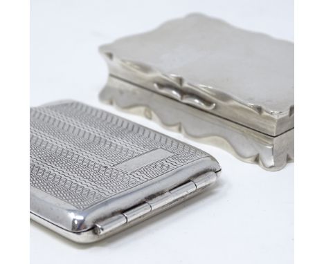 A George V silver snuffbox, by Deakin &amp; Francis, hallmarks Birmingham 1925, length 6cm, together with an engine turned si