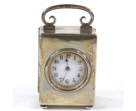 A late Victorian silver-cased carriage clock with enamel dial, Goldsmiths &amp; Silversmiths Co London, hallmarks 1897, case 