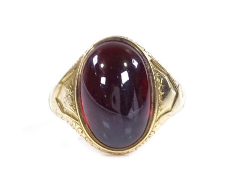 A Victorian 18ct gold foil-back cabochon garnet signet ring, with engraved shoulders and bridge, maker's marks V and S, hallm