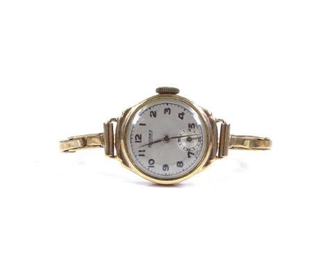ROTARY - a lady's 9ct gold mechanical wristwatch, 15 jewel movement with Arabic numerals and subsidiary seconds dial, on 9ct 