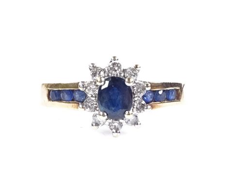 A 9ct gold sapphire and diamond cluster ring, with channel set sapphire shoulders, setting height 9.6mm, size N, 2.9g 