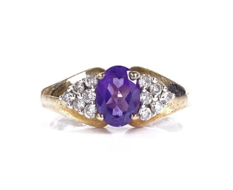 A 9ct gold amethyst and diamond cluster ring, setting height 7.4mm, size L, 4.1g 