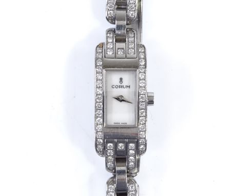 CORUM - a lady's stainless steel Baguette quartz cocktail wristwatch, with diamond set bezel and strap, approx 1.03ct total, 