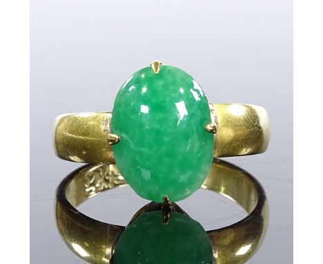 A Chinese 18ct gold green glass panel ring, panel height 13.3mm, size O, 4.8g 