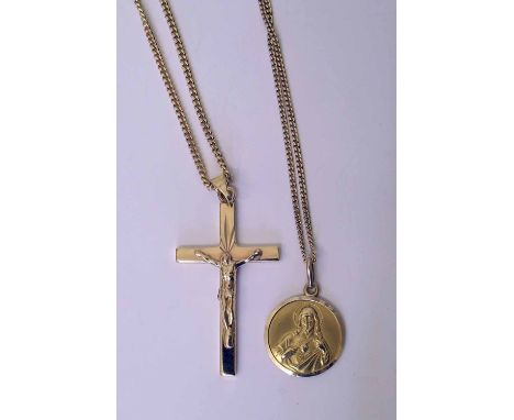 Gold medallion on chain and a gold crucifix on chain Condition report: see terms and conditions
