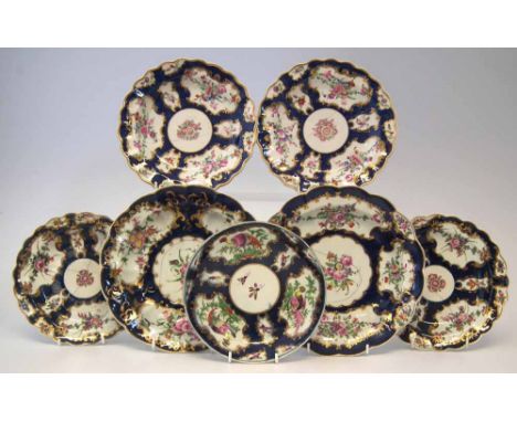 Worcester blue scale circa 1770 - 1790   to include four plates a saucer dish and two bowls painted with exotic birds and flo