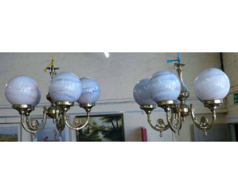 Pair of light fittings with marbled globes. Condition report: see terms and conditions