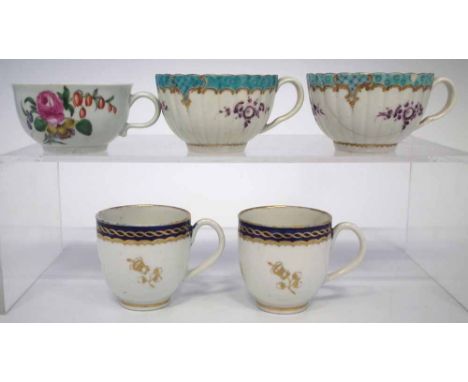 Five Worcester cups circa 1770   three painted in polychrome, two painted with blue and gilt borders, crescent marks and pseu