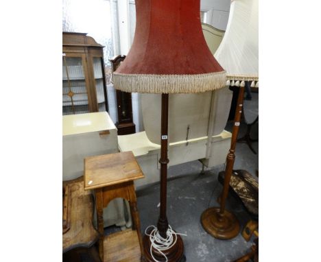 A Circular Based Mahogany Standard Lamp