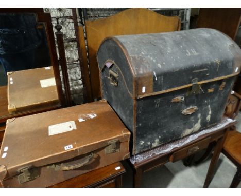 A Dome Topped Travelling Trunk Together With A Leather Suitcase