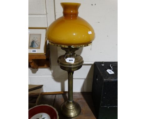 A Circular Based Brass Column Oil Lamp