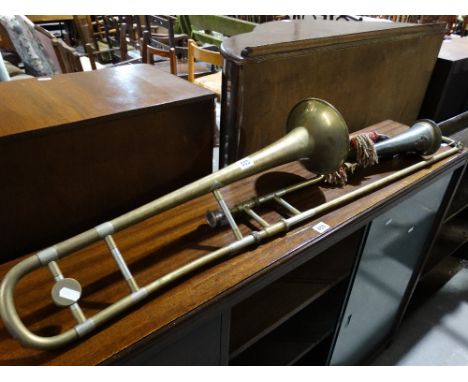 A Brass Finish Trombone By Boosey And Hawks Together With A Regimental Bugle