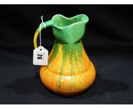 A Wade Pottery Drip Glazed Jug