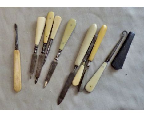 Victorian Manicure Set - A collection of 10 bone-handled toilet utensils including, files, tweezers and button hooks.