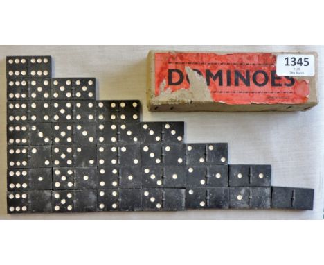 A vintage set of dominos in their original box