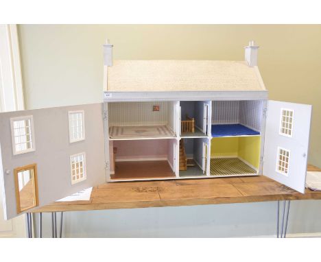 A vintage Georgian style dolls house 
The light grey painted house with Georgian windows, hinge doors enclosing  four interna