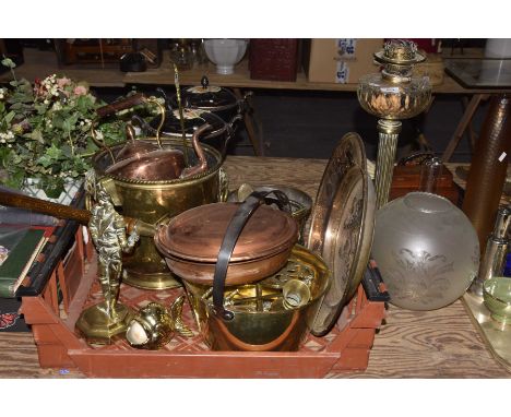 A quantity of metal wares, 19th/20th CenturyTo include a 19th Century oil lamp, preserve pans, kettle stands, toasting fork, 