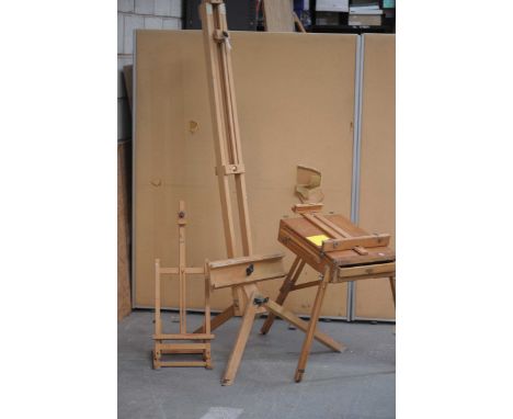 A group of three various easels To include a tri-pod standing example, a table easel and a MEBEF travel example, with enclose