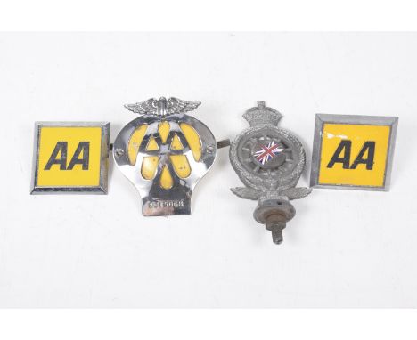A small group of car badges To include two mid to late 20th Century AA badges, No: 3679, an earlier AA badge stamped 8C15068 