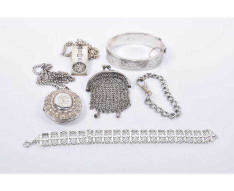 A silver oval locket pendant and chainTogether with, a silver hinge bangle, a silver ingot pendant, with remaining silver and