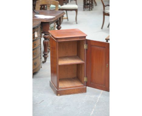 A Victorian mahogany pedestal pot cupboardThe moulded top with rounded front corners above a single panelled door enclosing a