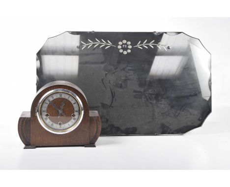A 1950s etched wall mirror Of rectangular canted form, with foliate etched design, together with a vintage 1930s mantle clock