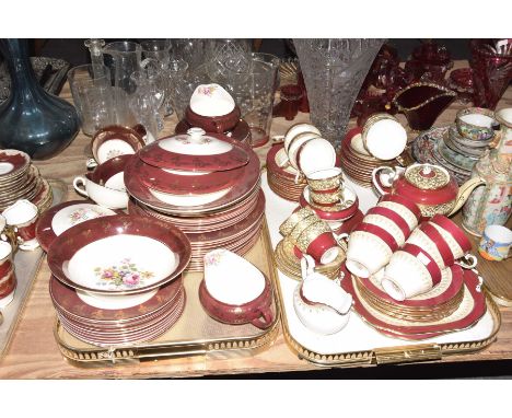 A large quantity of Aynsley dinner waresTo include an Aynsley red and gilt ground tea service comprising 12 teacups and sauce