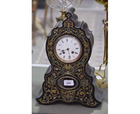 A 19th Century French ebonised glass and Mother of Pearl inlaid mantel clockWith a 10cm white dial signed Bennett, striking o