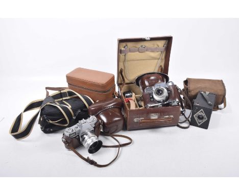 A collection of vintage camera's and equipmentTo include a Ensign E20, a Kodak Retima Reflex IV, and a Kodak Retima Reflex S,