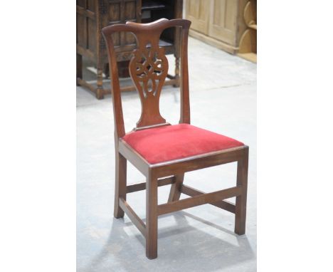 A set of six mahogany Chippendale style dining chairsEach chair with an interlaced openwork splat back above a red velour dro