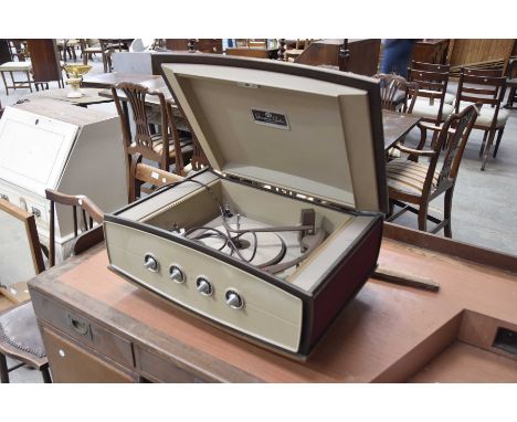 A Pye model 1005 record player, late 1950's early 1960's
Lift up lid to reveal a label Pye Stereophonic projection system, (s