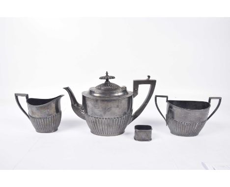 A George V silver three piece presentation tea serviceOf oval form, with fluted lower bodies, angular handles and applied ree