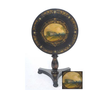 A late Victorian Liberty & Co., ebonised and painted tilt top tableThe tri-form base raised upon three compressed bun feet ex