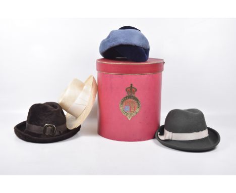 A vintage Christie's London hatbox
Together with four various ladies hats.