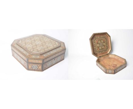 An Anglo-Indian box, early 20th Century The square section box with canted corners, inlaid with exotic woods, bone and mother