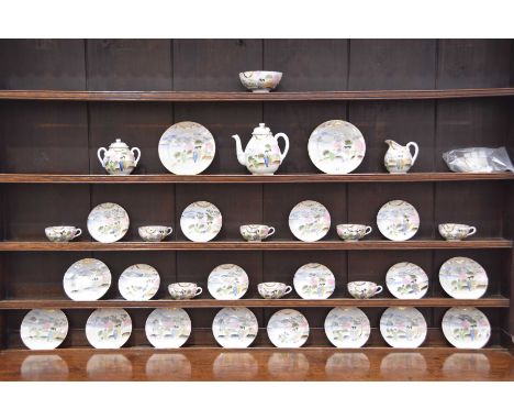 A Japanese egg shell porcelain nine piece tea service, early 20th CenturyTogether with two cake plates, teapot, sugar bowl, m