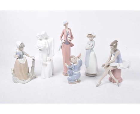 A collection of Nao figures To include a girl in a bonnet with puppy, a young boy playing with an aeroplane, a ballarina, and