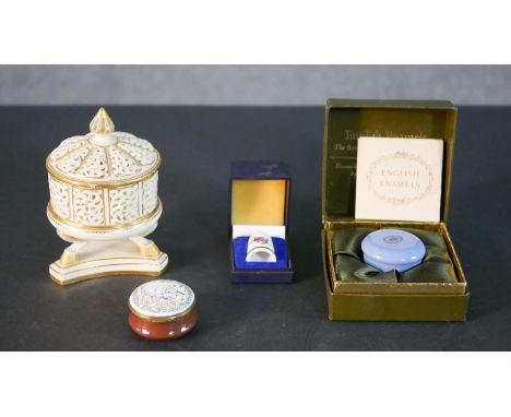 A collection of trinket boxes including, a pierced porcelain and hand gilded Oriental design lidded box made by Grainger &amp