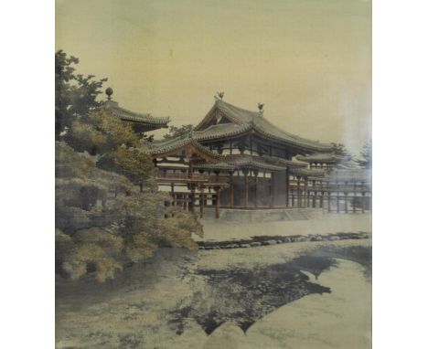 A framed and glazed vintage Japanese print on silk of a pagoda with river and trees, unsigned. H.85 W.79cm 
