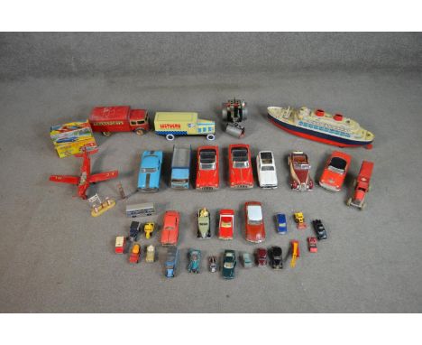 A collection of vintage tinplate and die cast vehicles and scenery, including Corgi, Trade Mark Modern Toys, Matchbox, Mamod 