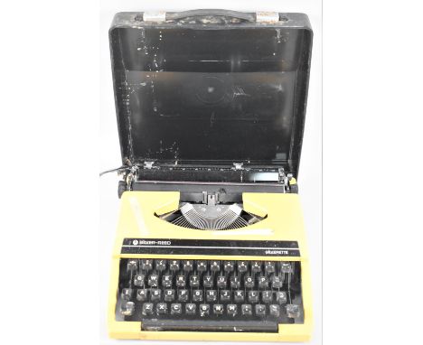 A Mid 20th Century Silver-Reed Silverette Portable Manual Typewriter in Yellow 