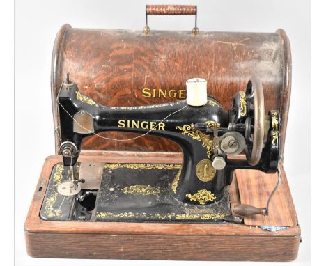 A Vintage Oak Cased Manual Singer Sewing Machine 