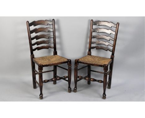A Pair of Reproduction Rush Seated North Country Style Ladder Back Chairs 