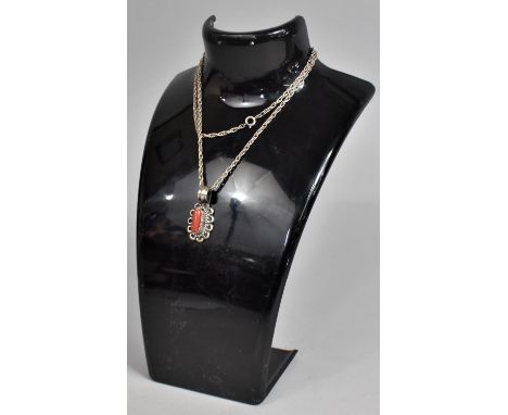 A Silver and Coral Pendant on 50cm Silver Chain 