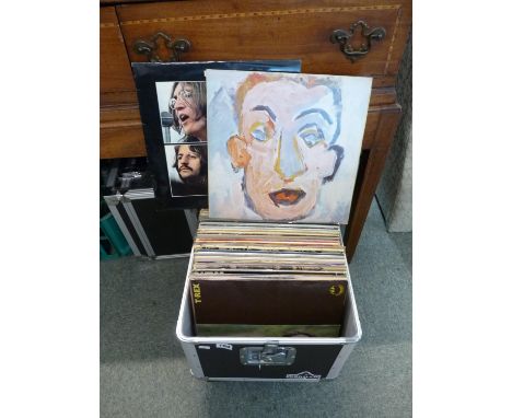 Collection of assorted Records Rolling Stones, Beatles and others and a qty. of Singles both in flight cases 