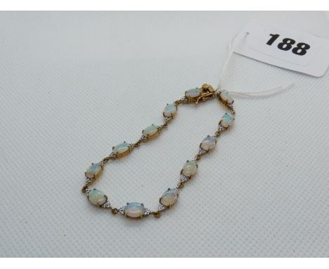 Good Quality Ladies 9ct Gold Opal and Diamond set Bracelet with safety clasp, 8.3g total weight 