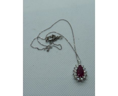 Impressive Ladies 18ct White Gold Drop Pendant of Ruby Setting 2.4ct surrounded by total 1.00ct Diamonds estimated, on 18ct W