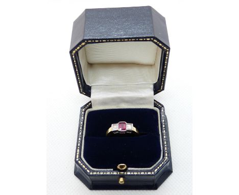 Ladies Art Deco Style 18ct Gold ring with Rubover set Emerald Cut Ruby 0.42ct Estimated, Flanked by 2 0.15ct Square Cut Diamo